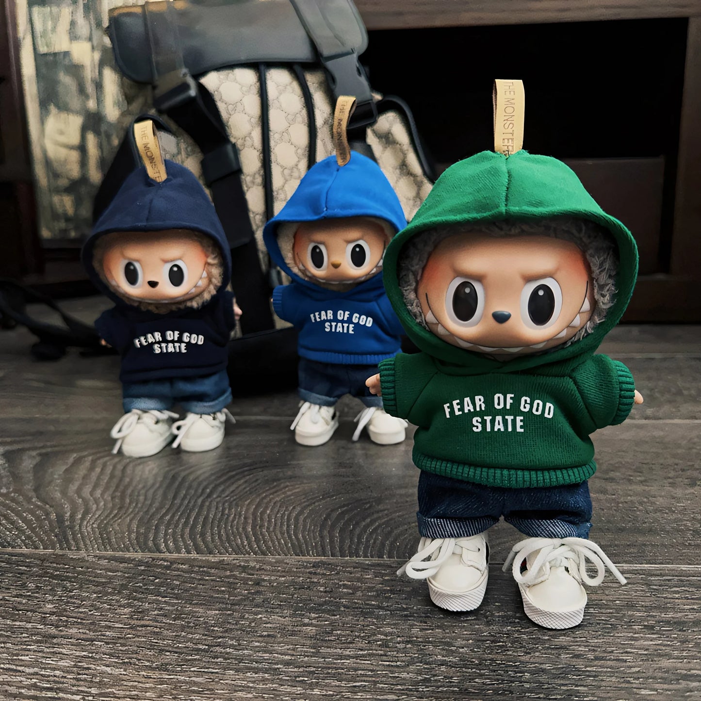 Labubu doll-style streetwear hoodie set, paired with jeans and sneakers, for an urban look.